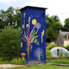 transformer house with dandelion drawing at night