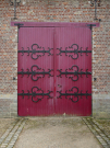 France 2022 - Castle of Regnière-Écluse - door to the stables in the outer court