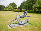 France 2022 - Castle of Regnière-Écluse - dogs statue in the park