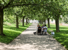 valloires abbey and garden - garden idyllic lane with people having a lunch