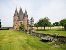 carrouges castle orne 4- gate house seen from the orchard