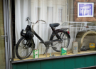 domfront-en-poiraie-3-shop-with-old-solex