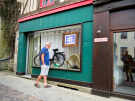 domfront-en-poiraie-4-tourist-admiring-old-solex 
