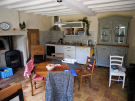 gite-le-taillis-pervencheres-10-cosy-living-with-kitchen