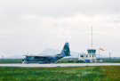 hebrides 1980 north-uist: hercules 130 in front of flight control on benbecula airport