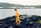 hebrides 1980 north-uist; arie in rain cover at loch aulasary