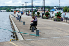 jyvaskyla labour and leisure - harbor area with people fishing on the pier