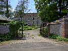 manoir-des-perignes-1 main gates to the castle grounds
