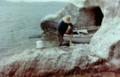 milos 1988 - around adamantas - old fisherman in fishing village klima looking at his catch of kalamari
