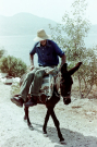 milos 1988 - around adamantas - on the way home on his donkey
