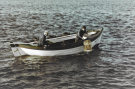 john o groats - lobster fishermen sinking a lobster cage