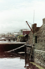 the sea front of stromness with crane