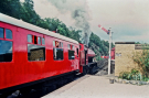 steam railways in britain1979 -  lakeside and haverthwaite railway - red train with saddletank on its way