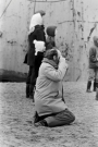 The end of Freighter Wan Chun which run aground in the Netherlands (Nov 1973 )- Man photographing the capsized ship